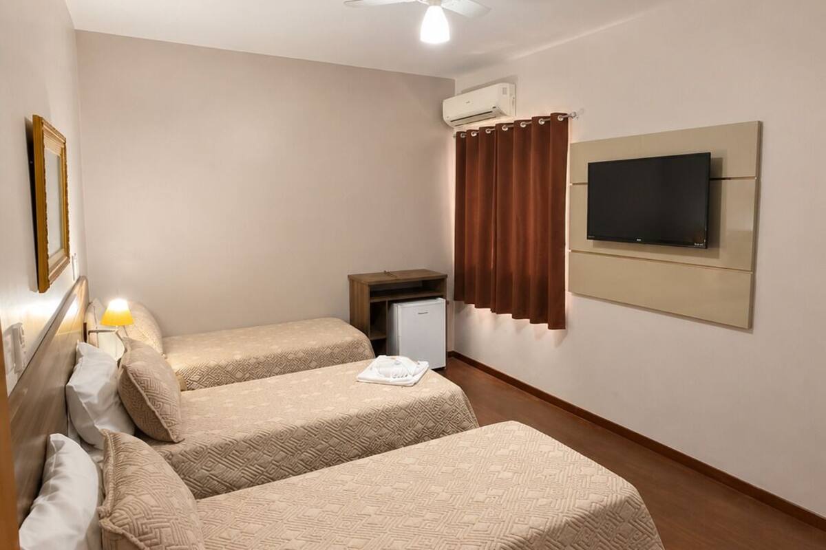 Chambre Simple Deluxe, vue ville | Fer et planche à repasser, Wi-Fi gratuit, draps fournis
