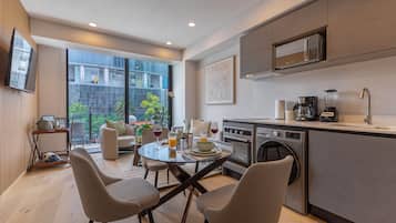 Departamento Premium, balcón, vista a la ciudad | Comedor