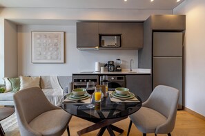 Departamento Premium, balcón, vista a la ciudad | Cocina privada