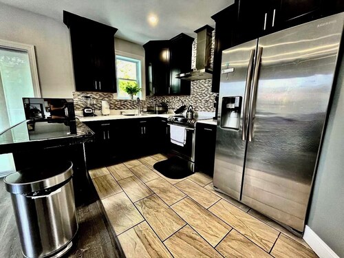 Spacious 6-Bedroom Home w/ Private Parking & Fenced Patio
