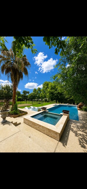 Pool - Spacious 4-bedroom home complete with resort style pool, hot tub & sauna (Sealy)