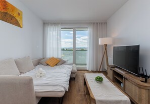 Een strijkplank/strijkijzer, wifi, beddengoed