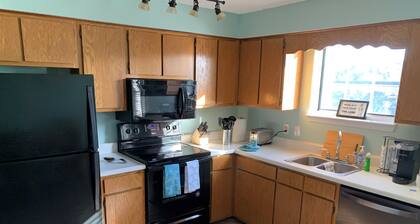 2-bedroom condo in tranquil Clemson with cool AC, walkable to campus.