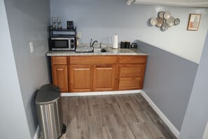Fridge, microwave, blender, dining tables