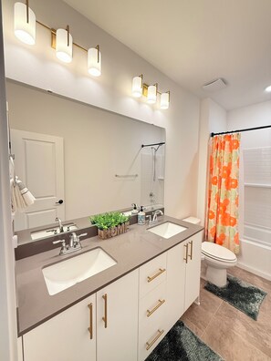 Hair dryer, bidet, towels, soap