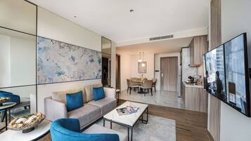 Deluxe Apartment, 2 Bedrooms | Living area | Smart TV