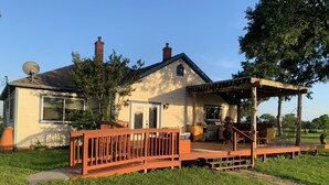 A house with a deck, a barbecue area, and a satellite dish. - A little bit of heaven on a fun filled ranch outside quaint Brenham (Brenham)