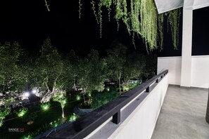Kamar Double atau Twin Deluks, balkon, pemandangan kebun | Halaman properti