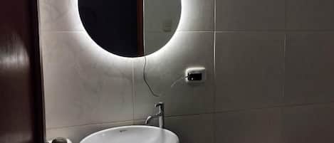 Shower, towels, soap, toilet paper