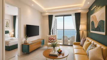 Executive Suite, 2 Bedrooms, Balcony, Beach View | Living area | 50-inch Smart TV with cable channels