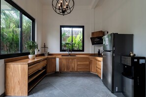 Vila superluxo, sacada, vista para o jardim | Cozinha privada