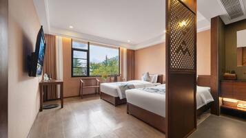 Deluxe Twin Room, Courtyard View | In-room safe, blackout drapes, soundproofing, iron/ironing board