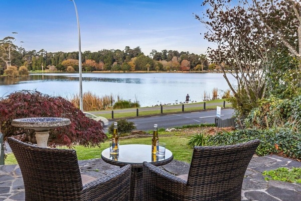 Settle into your lakeside retreat with a cold drink in hand, watching the water reflect the afternoon light.