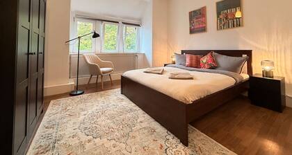 Elegant 4BR Apartment | Walk to City + Balcony