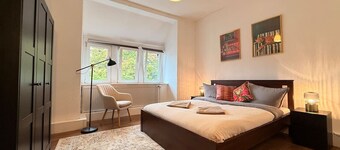 Elegant 4BR Apartment | Walk to City + Balcony