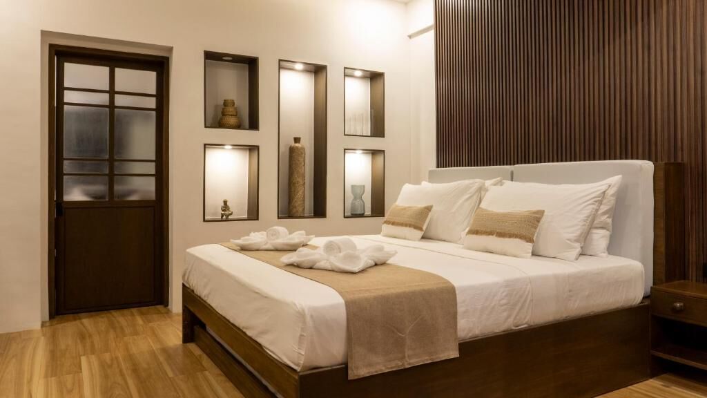 Suite, Balcony, Garden View | In-room safe, desk, laptop workspace, free WiFi