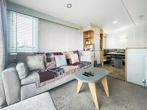 TV - Experience luxury in this classy, homey caravan at St Andrews Holiday Park. (St Andrews)