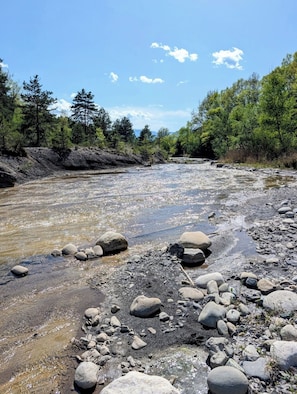 A river with rocks and trees.