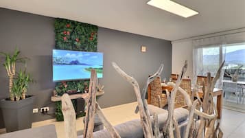 Comfort Apartment, Balcony, Mountain View | Living area | 110-cm LED TV with cable channels