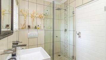 Luxury Double Room, Patio | Bathroom | Shower, towels, soap, toilet paper