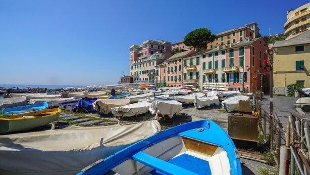 A coastal town with colorful buildings, a marina with covered boats, and a clear blue sky. - 2 bedroom lovely apartment in Genova (Genova)