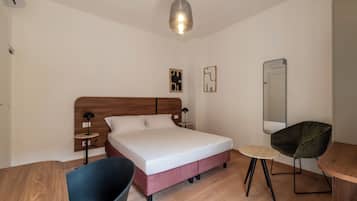 Desk, laptop workspace, free WiFi, bed sheets