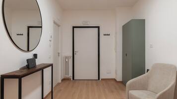 Standard Apartment, 3 Bedrooms, Balcony | Living area | 32-inch Smart TV with cable channels