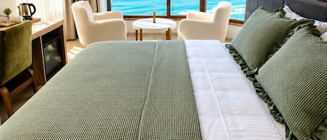 Deluxe Double Room, Sea View | Minibar, in-room safe, desk, laptop workspace