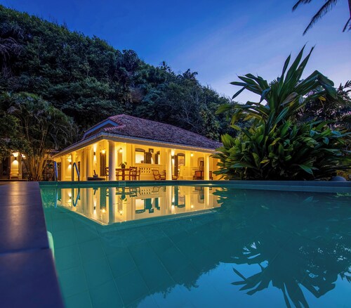 The Well House Galle offers a peaceful tropical villa stay in Unawatuna.