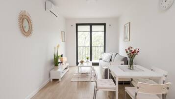 Classic Apartment, Balcony, Courtyard View | Living area | Flat-screen TV