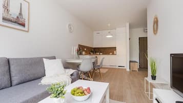 Comfort Apartment, Balcony, Courtyard View | Living area | Flat-screen TV