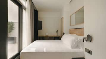 Down comforters, minibar, in-room safe, iron/ironing board