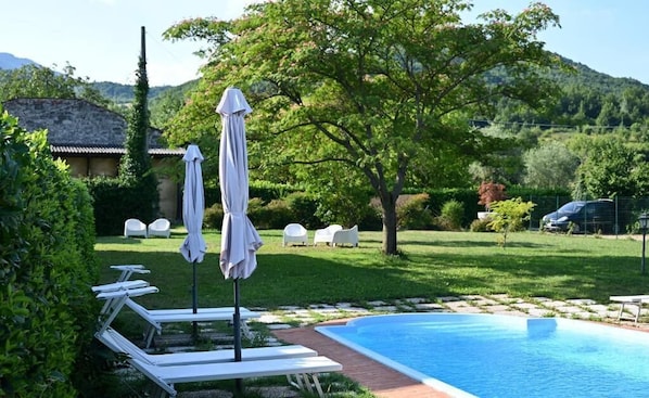 Seasonal outdoor pool, pool umbrellas, sun loungers