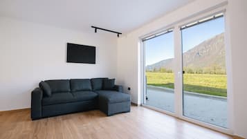 Apartamento, 2 quartos | Área de estar