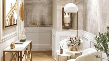 Deluxe Quadruple Room, Courtyard View | Interior