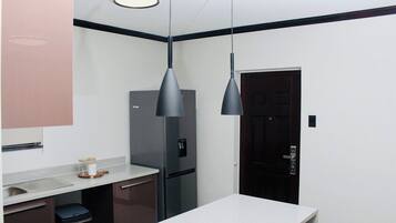 Apartamento conforto, sacada | Cozinha privada