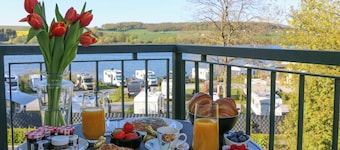 Design-FeWo at the Möhnesee with unique lake view, balcony, pool, sauna, elevator