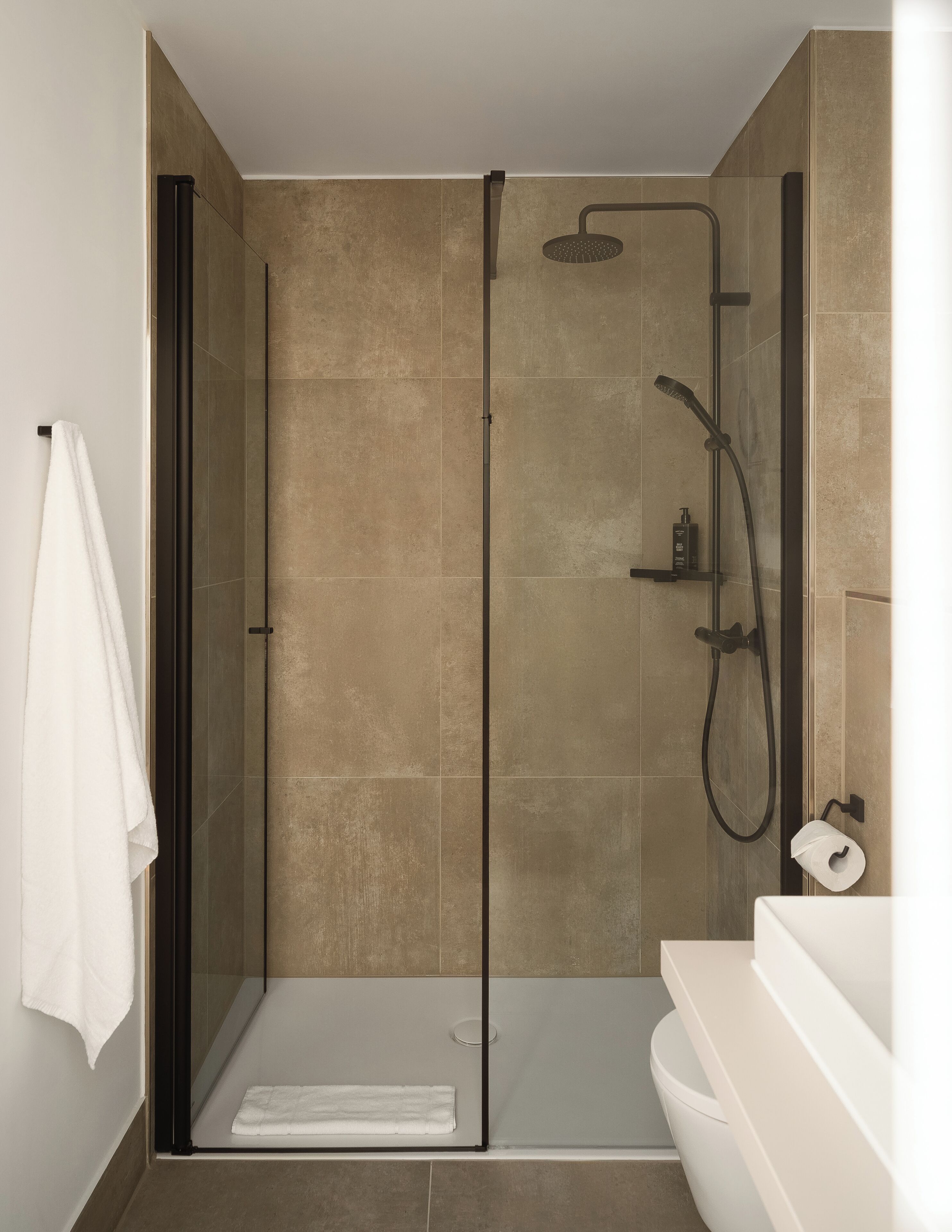 Shower, eco-friendly toiletries, hair dryer, towels