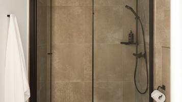 Shower, eco-friendly toiletries, hair dryer, towels