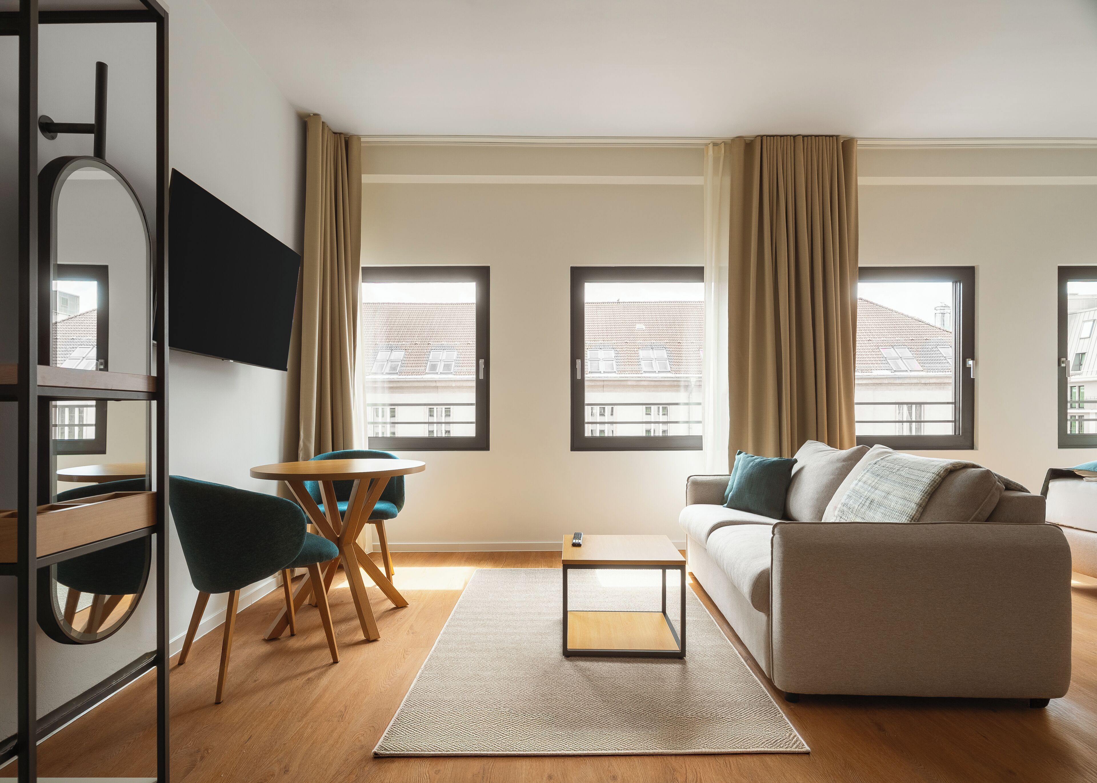 Comfort Suite with sofa bed | Living area | 50-inch flat-screen TV with cable channels