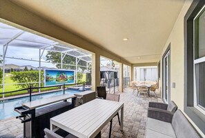 Outdoor dining - Ultimate 9BR Villa | Pool | Resort | Near Disney (Kissimmee)