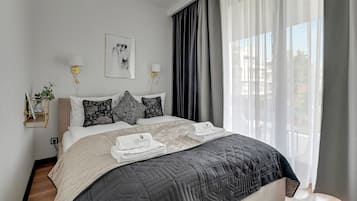 Deluxe Apartment, Balcony, Courtyard View | Individually furnished, iron/ironing board, free WiFi, bed sheets