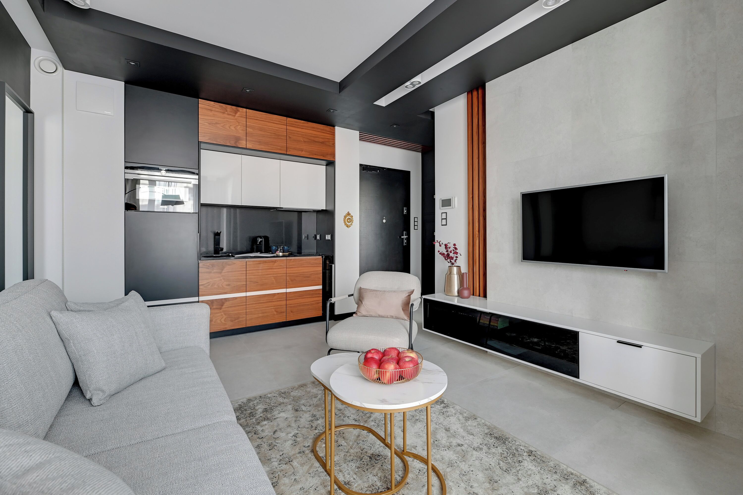 Deluxe Apartment, Balcony, Courtyard View | Living area | 40-inch flat-screen TV with cable channels