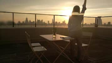Standard Quadruple Room, Balcony, City View | Outdoor dining