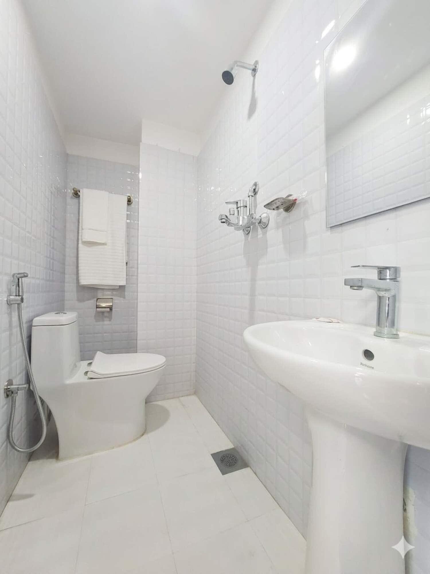 Shower, rainfall showerhead, soap, shampoo