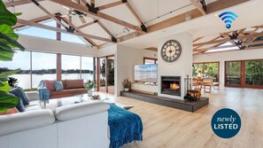 Living area - Island Oasis – absolute waterfront, boat ramp, firepit (Comerong Island)