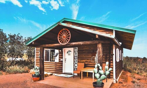 Rustic Cabin Rental with Porch at Foot of Abajo Mountains near Moab, Utah