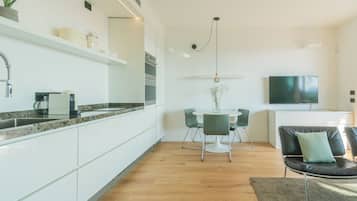 Apartment (1 Bedroom) | Private kitchen | Oven, espresso maker, electric kettle, high chair