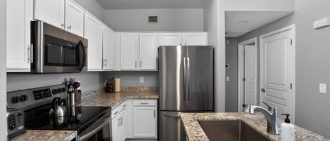 Condo, 2 Bedrooms | Private kitchen | Fridge, oven, coffee/tea maker, toaster