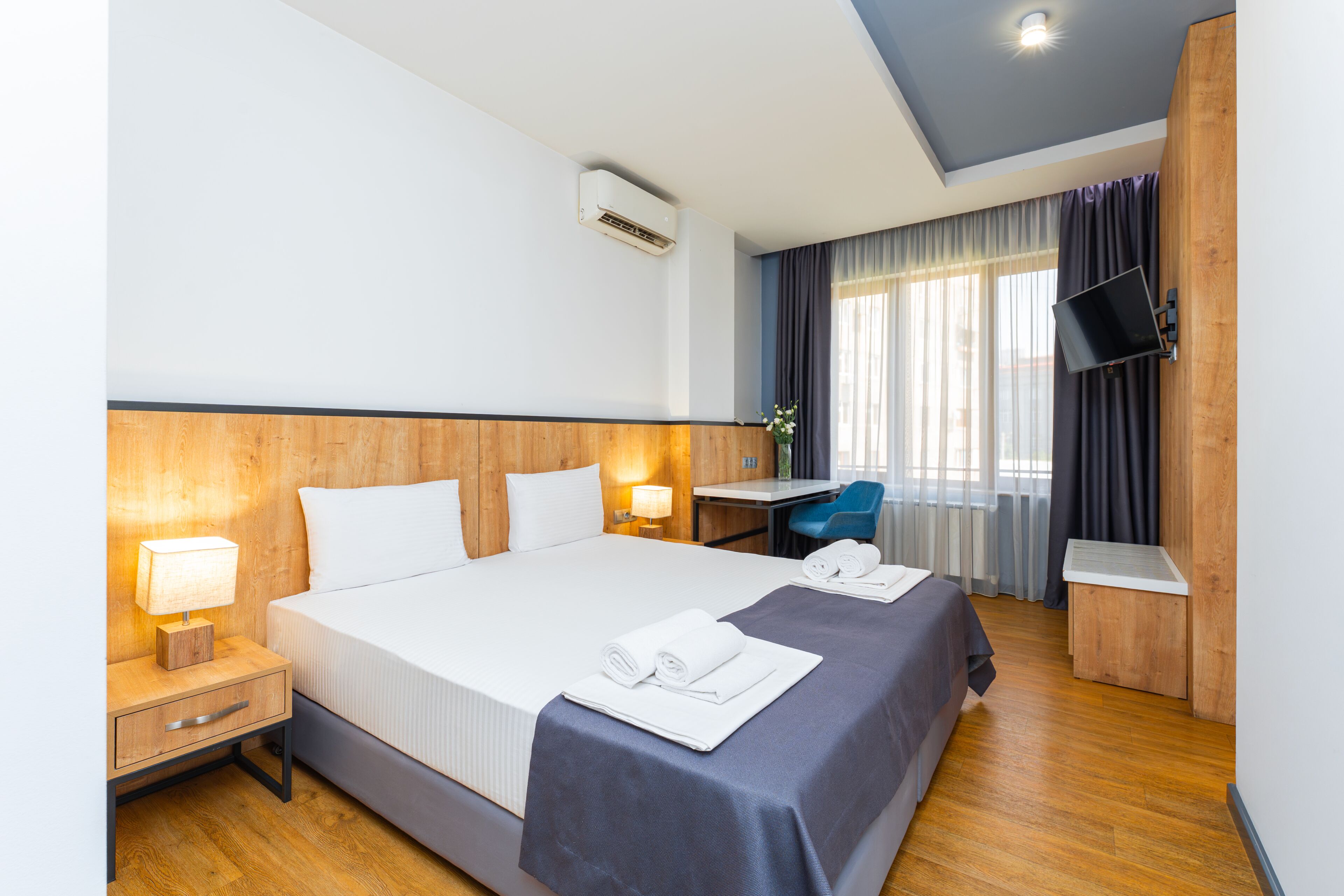 Deluxe Double or Twin Room, Kitchenette | In-room safe, desk, blackout curtains, iron/ironing board (on request)